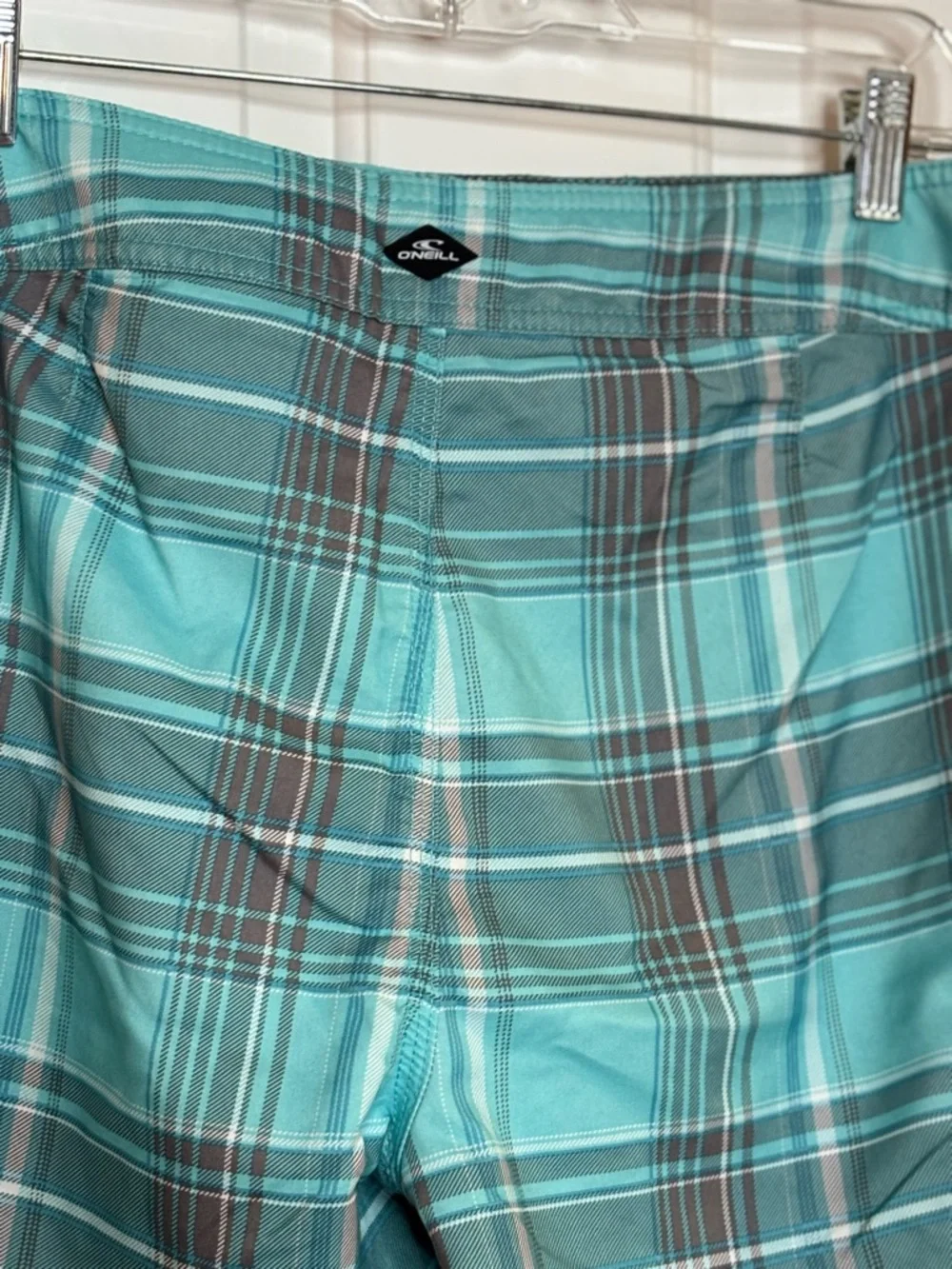 EUC O'Neill Men’s Teal Plaid Boardshorts With Velcro and tie closure size 32